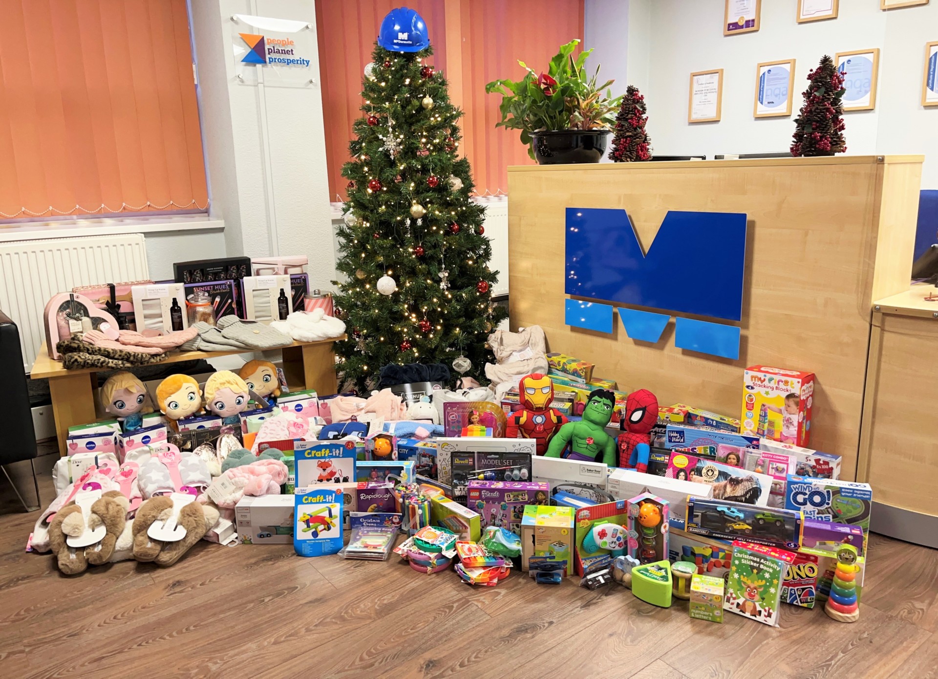 McDermotts staff donate over 200 gifts to families who are within refuges and the local community.